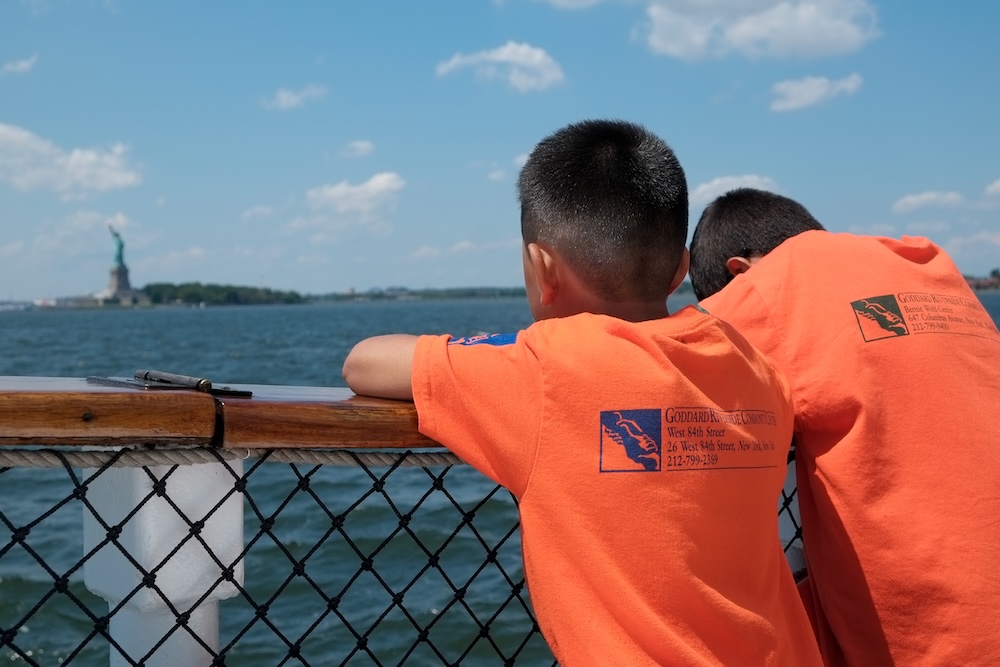 Students participating in Harbor Camp™ on the waterfront